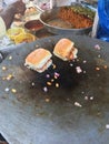 Common snack in India Kutchi dabeli. Royalty Free Stock Photo