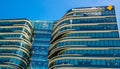 Commonwealth Bank of Australia, the image shows beautiful design glass windows of its office building at Darling harbour branch. Royalty Free Stock Photo