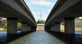 Commonwealth Bridge over Lake Burley Griffin in Australia capital city Canberra. Australian Parliament House at the end of the Royalty Free Stock Photo