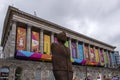 Commonwealth Games 2022, Anthony Gormley`s Iron:Man Statue in front of Birmingham Town Hall Royalty Free Stock Photo