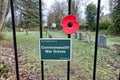 A Commonwealth War Graves sign on a churchyard gate