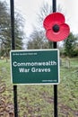 A Commonwealth War Graves sign on a churchyard gate