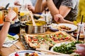 Communal table with fresh pizza