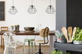 Communal table and pendant lamps