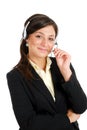 Communcations business woman holding her headset Royalty Free Stock Photo