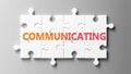 Communicating complex like a puzzle - pictured as word Communicating on a puzzle pieces to show that Communicating can be