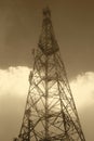 Communication antennae on a misty day in warm tone Royalty Free Stock Photo