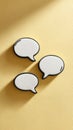 Communication dialog speech bubbles on yellow background Royalty Free Stock Photo