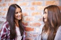 Communication, friends and women in university in conversation, talking and chatting for class on campus. Education Royalty Free Stock Photo