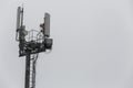 communication and gsm, wcdma, hspda and other 3g, 4g standarts tower close-up in cloudy weather