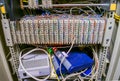 Communication patch panel for ip telephony. Modems and switches are in the datacenter server room box. The front panel of a