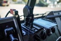 Communication radio transceiver speaker mounted on military vehicle dashboard, closeup detail Royalty Free Stock Photo