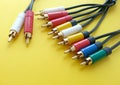 Communication rca audio video cable on a yellow background Royalty Free Stock Photo