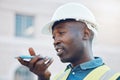 Communication, safety and a construction worker on phone call or sending voice note. A black man, engineer or builder on