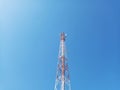 The Communication Signal Tower Rises High Into the Sky During the Hot Day