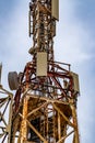 Communication tower with blue sky and clouds moving background Royalty Free Stock Photo