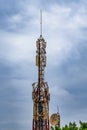 Communication tower with blue sky and clouds moving background Royalty Free Stock Photo