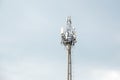 Communication tower design or Construction of communication mast on cloudy sky. Wi-Fi wireless network, mobile communication, Royalty Free Stock Photo
