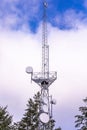 Communication tower with group of parabolic antennas
