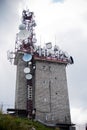 Communication tower with many parabolic antennas Royalty Free Stock Photo