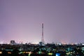 Communication tower on night city Royalty Free Stock Photo