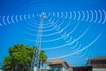 Communication tower send and receive radio wave to home Royalty Free Stock Photo