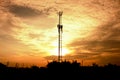 The Communication tower and sunlight in evening. Royalty Free Stock Photo