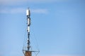 communication tower top. Radio antenna Tower , microwave antenna tower on light sky background. wireless technology Royalty Free Stock Photo