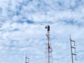 Communication towers with power poles