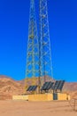 Communication towers and solar panels in bedouin village in Sinai desert, Egypt Royalty Free Stock Photo