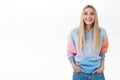 Communication, youth and lifestyle concept. Attractive young girl with long blonde hair, beaming smile with white teeth