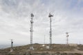 A communications center on top of a hill with large, tall antennas. Big Data. Royalty Free Stock Photo