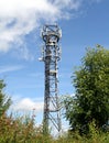 Communications Mast against a Blue Sky Royalty Free Stock Photo
