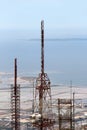 Communications towers, against the sea