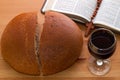 Communion, bread, wine and Bible on the table Royalty Free Stock Photo