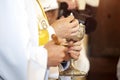 Communion and priest hand. Priest celebrate mass at the church.