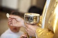 Communion and priest hand. Priest celebrate mass at the church.