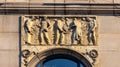Communist classic art relief at facade of PiÃâ¢kna 36 building of MDM quarter at Constitution square in Warsaw, Poland