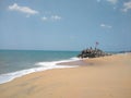 communist flag floating in the wind blue sky background, Pozhikkara beach Kollam Kerala