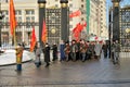 Communists assign flowers to a tomb of the Unknown