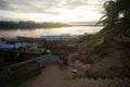 Community of fishermen unloading fish from their boats on the Huallaga River in the Peruvian jungle.