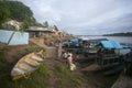 Community of fishermen unloading fish from their boats on the Huallaga River in the Peruvian jungle.