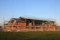 Community hall under construction, roof in place