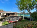 Community jacuzzi and tennis court inside typical private condo complex. Royalty Free Stock Photo