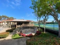 Community jacuzzi and tennis court inside typical private condo complex.