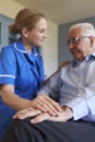 Community Nurse Visits Senior Man Suffering With Depression