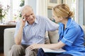 Community Nurse Visits Senior Man Suffering With Depression