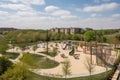 a community park with a playground, sports courts, and picnic areas