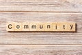 Community word written on wood block. Community text on table, concept Royalty Free Stock Photo