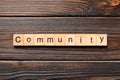 Community word written on wood block. Community text on wooden table for your desing, Top view concept Royalty Free Stock Photo